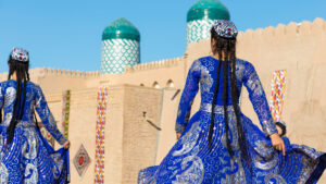 Woman in traditional blue dress | Uzbekistan | The Ultimate Travel Company