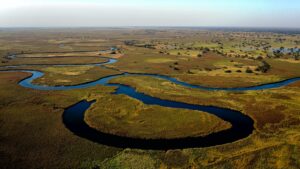 Aerial View of Okavango Delta in Botswana | Luxury Botswana Safari Holidays | The Ultimate Travel Company