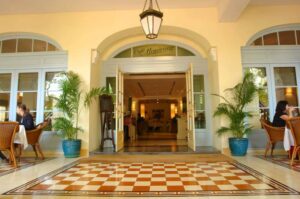 Raffles Hotel Le Royal, Phnom Penh | Cambodia | Raffles Hotel Le Royal entrance | The Ultimate Travel Company