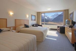 The Hermitage Hotel, Aoraki Mount Cook | Hotel's cozy bed | New Zealand | The Ultimate Travel Company