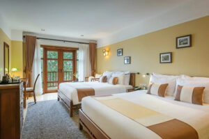 La Siesta Hoi An Resort & Spa | Hoi An | Interior and 2 king size bed in La Siesta | The Ultimate Travel Company