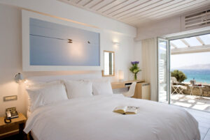 Grace, Mykonos | Greece | cozy bedroom | The Ultimate Travel Company