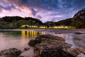Helena Bay Lodge | Luxury estate with a large swimming pool overlooking a serene bay | New Zealand | The Ultimate Travel Company
