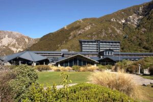 The Hermitage Hotel, Aoraki Mount Cook | The Hermitage exterior at daytime | New Zealand | The Ultimate Travel Company