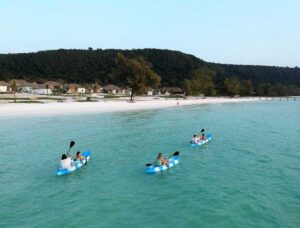 The Royal Sands Ocean View with People Kayaking | Cambodia Holidays | The Ultimate Travel Company