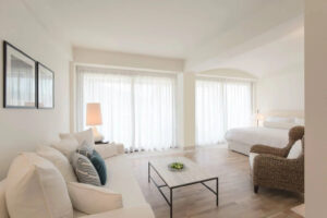 Blue Palace, Elounda, Crete | Greece | Bright, airy hotel room with modern decor | The Ultimate Travel Company