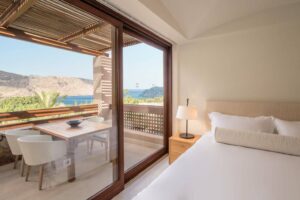 Blue Palace, Elounda, Crete | Greece | Bright, airy hotel room with modern decor | The Ultimate Travel Company