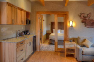 Moose Hotel And Suites, Banff | Bedroom's interior | The Ultimate Travel Company