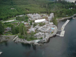 Sonora Resort, Vancouver Island | Canada | Aerial view of a lakeside resort surrounded by forested mountains | The Ultimate Travel Company