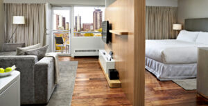 The James Hotel, Saskatoon | Canada | Hotel's interior, bed and tv | The Ultimate Travel Company