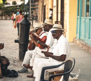 Havana | Three musicians playing traditional Cuban music on a street | The Ultimate Travel Company