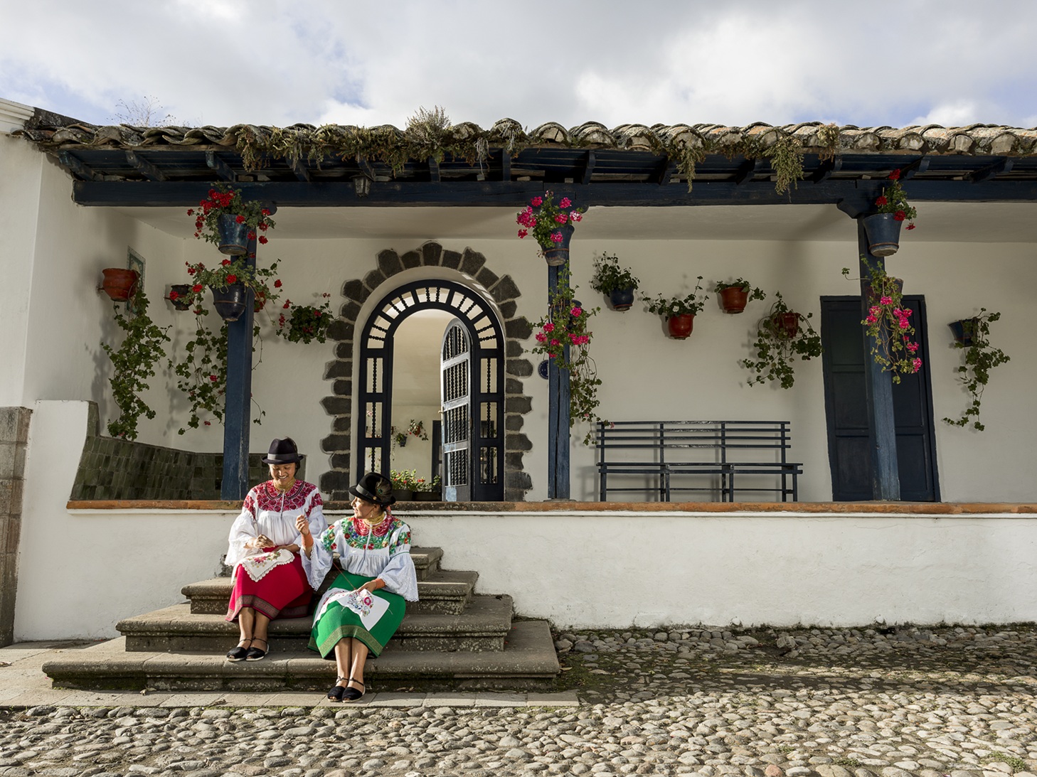 Zuletenas Sitting on the Steps at Hacienda Zuleta | Luxury Ecuador Holidays | The Ultimate Travel Company