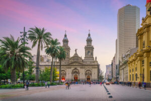 cathedral and buildings at a city street in santiago chile | ultimate travel company