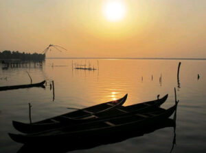 The Discovery Houseboat | India | boat sunset | The Ultimate Travel Company