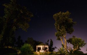 Ananda In The Himalayas | India | the Ananda garden at night | The Ultimate Travel Company