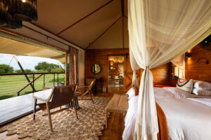 Bedroom with Deck in a Private Retreat at Sayari Camp, Asilia | Serengeti National Park | Tanzania Safaris | Luxury Holidays by The Ultimate Travel Company