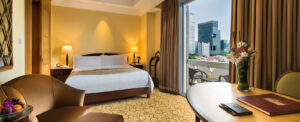 Fullerton Hotel, Singapore | Singapore | Fullerton bedroom | The Ultimate Travel Company
