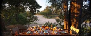 JONGOMERO, RUAHA NATIONAL PARK | Africa | Dining area beside the river | The Ultimate Travel Company