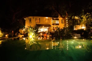 Old Harbour Hotel, Fort Kochi | India | the pool at night | The Ultimate Travel Company