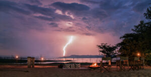 Changa Safari Camp, Matusadona National Park | Zimbabwe | Changa Safari Camp at night with lighting | The Ultimate Travel Company