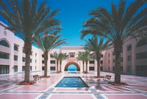 Luxury Resort with Palm Trees and a Swimming Pool | Luxury Oman Holidays | The Ultimate Travel Company