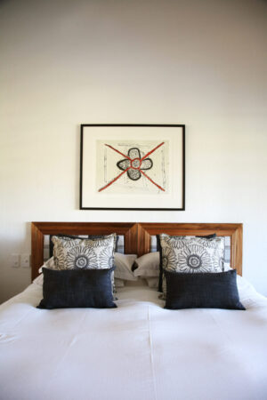 El Questro Homestead, Kununurra | Australia | Hotel bed with decorative pillows | The Ultimate Travel Company