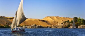 A Boat Cruising the Nile in Aswan | Egypt Holidays | The Ultimate Travel Company