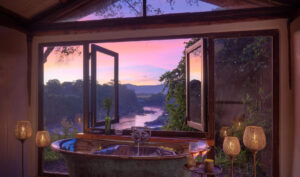 House In The Wild, Masai Mara | Kenya | Bathroom with overlooking river | The Ultimate Travel Company