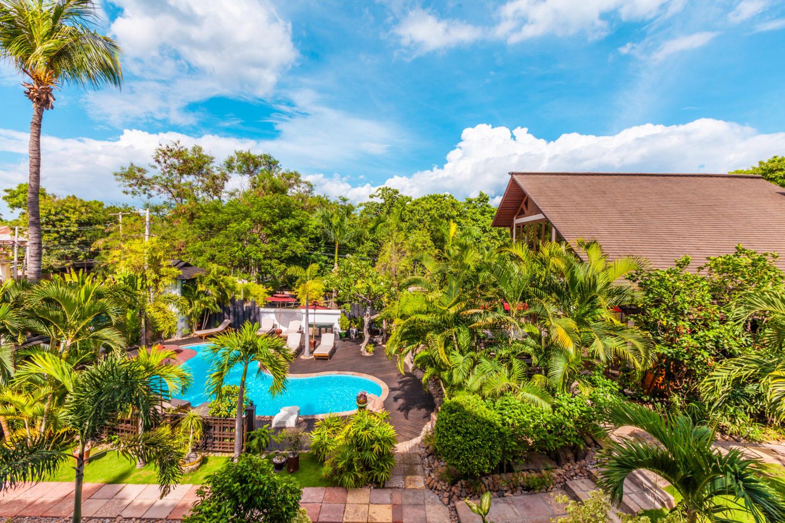 Hotel By The Red Canal, Mandalay | Myanmar | aerial view of the Pool and hotel | The Ultimate Travel Company
