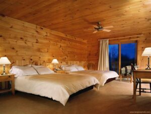Hôtel Sacacomie, Laurentian Mountains | Canada | bedroom | The Ultimate Travel Company