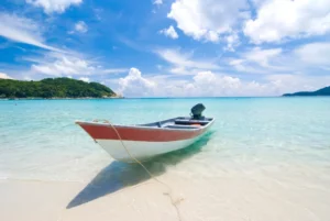 Boat on a Beach | Indonesia Holidays | The Ultimate Travel Company