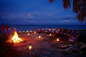 Sitting Around a Campfire at Manda Bay | Kenya Holidays | Kenya Safaris | The Ultimate Travel Company