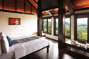Bedroom in Taj Madkeri Resort & Spa | India Holidays | The Ultimate Travel Company