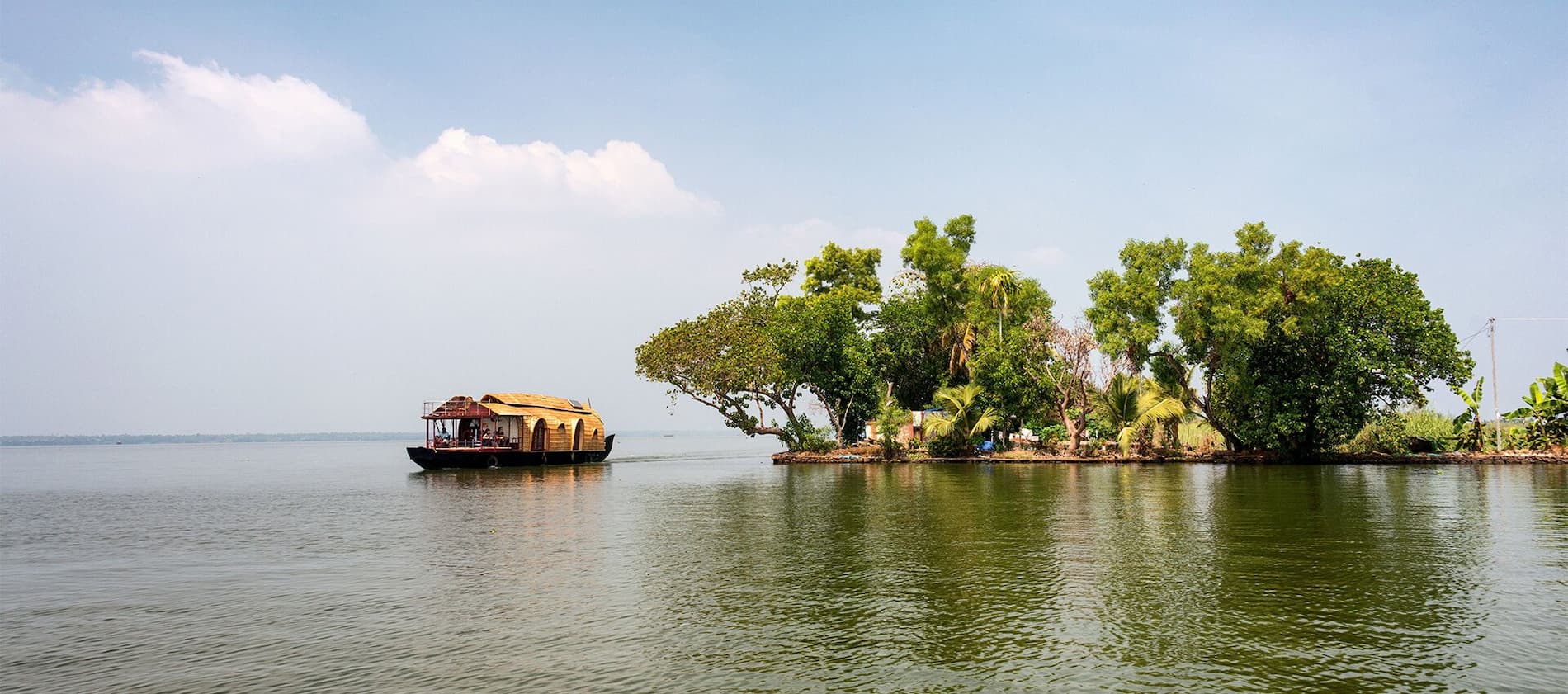 Boat on the Water in the Malabar Coast | India Holidays | The Ultimate Travel Company