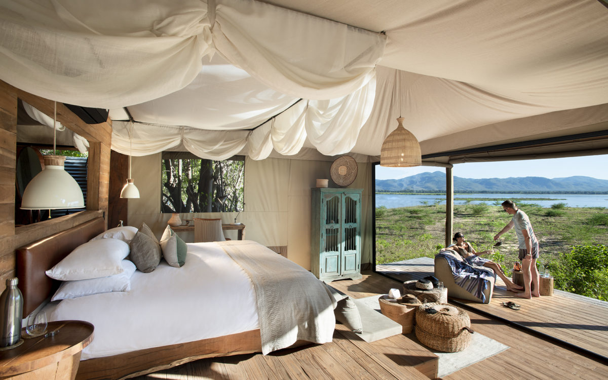 Nyamatusi Camp, Mana Pools National Park | Zimbabwe | Couple iniside the Nyamatusi bedroom | The Ultimate Travel Company