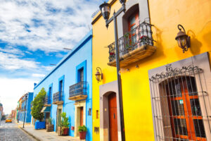 Colourful Buildings on an Oaxaca City Street | Mexico Holidays | The Ultimate Travel Company