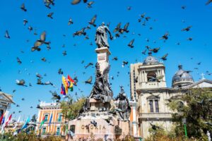 Pigeons Flying Around Plaza Murillo in La Paz | Luxury Bolivia Holidays | The Ultimate Travel Company
