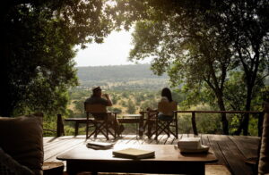 A Couple Looking Over the Maasai Mara | Kenya Safaris | Kenya Holidays | The Ultimate Travel Company
