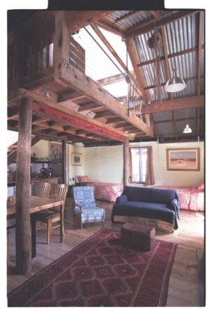 Old Leura Dairy, Blue Mountains | Australia |Rustic cabin living room with loft and furniture | The Ultimate Travel Company