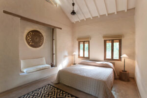 Tiger Tops Karnali Lodge, Bardia National Park | Nepal | bedroom | The Ultimate Travel Company