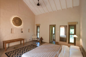 Tiger Tops Karnali Lodge, Bardia National Park | Nepal | bedroom | The Ultimate Travel Company