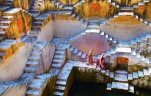 Two People Walking Down Multiple Stairs in Rajasthan | India Holidays | The Ultimate Travel Company