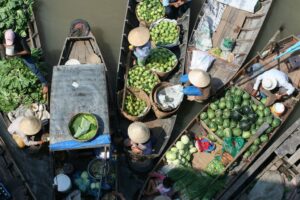 Vegetable Merchants on the Mekong Floating River Market | Luxury Cambodia Holidays | The Ultimate Travel Company