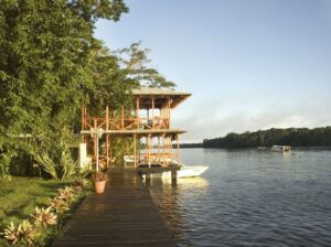 Manatus Hotel, Tortuguero | Costa Rica | living area beside the terrace | The Ultimate Travel Company