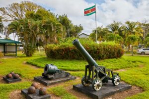 Canons with the Flag of Suriname in Fort New Amsterdam | Luxury Guiana Holidays | The Ultimate Travel Company