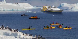 Ultramarine | Arctic And Antarctica | group of people are kayaking | The Ultimate Travel Company