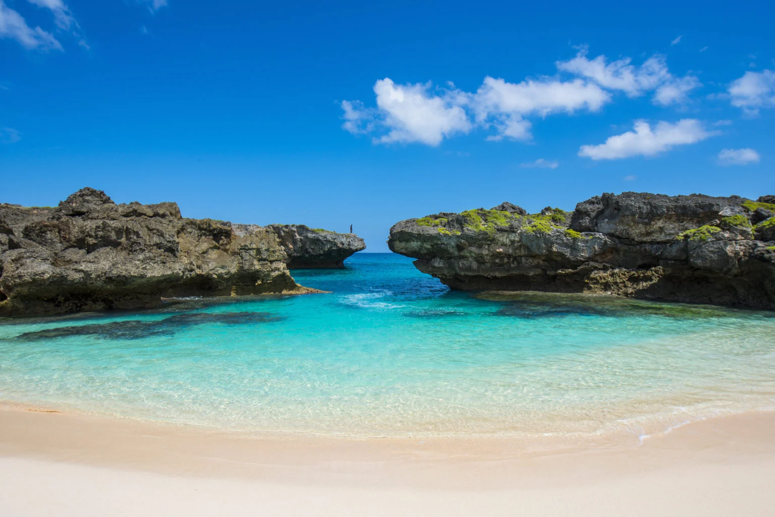 Beautiful Waters, Rocky Coves and Golden Sandy Beach in Indonesia | Luxury Indonesia Holidays | The Ultimate Travel Company