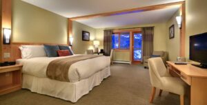 Tyax Wilderness Resort & Spa, Southern Chilcotin Mountains | British Columbia | Bedroom | The Ultimate Travel Company