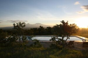 Campi Ya Kanzi, Chyulu Hills | Kenya | Pool view | The Ultimate Travel Company