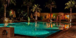 Hotel Dar Zitoune, Taroudant | Morocco | the pool in the night | The Ultimate Travel Company